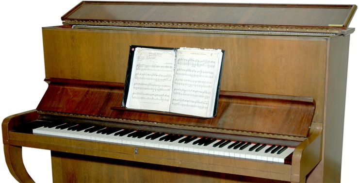 Old Piano and Sheet Music